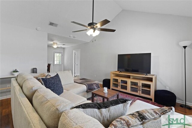 726 Timber Ridge Trl, Hinesville, GA 31313 - living area featuring vaulted ceiling, baseboards, ceiling fan, visible vents, and wood finished floors
