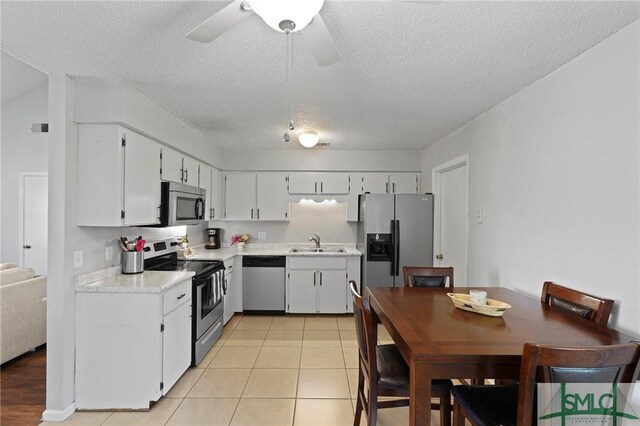726 Timber Ridge Trl, Hinesville, GA 31313 - kitchen featuring light countertops, a sink, white cabinetry, appliances with stainless steel finishes, and visible vents