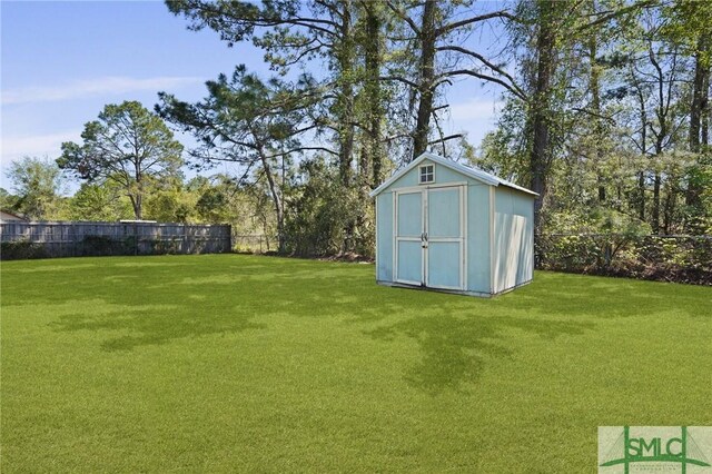 726 Timber Ridge Trl, Hinesville, GA 31313 - view of shed featuring a fenced backyard