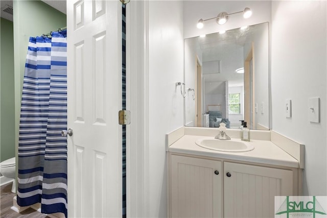 90 Cottage Ct, Richmond Hill, GA 31324 - bathroom with toilet and vanity