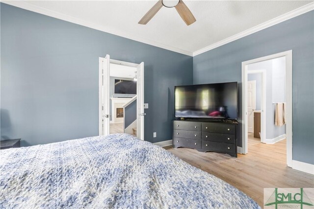 90 Cottage Ct, Richmond Hill, GA 31324 - bedroom featuring baseboards, ornamental molding, wood finished floors, and a ceiling fan