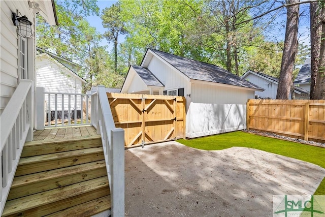 90 Cottage Ct, Richmond Hill, GA 31324 - view of outbuilding featuring a gate and fence