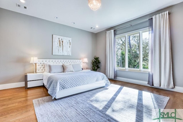28 Delegal Rd, Savannah, GA 31411 - bedroom with baseboards, visible vents, wood finished floors, and recessed lighting
