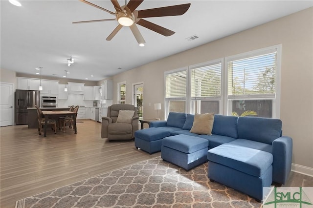 126 Canter Ct, Savannah, GA 31406 - living room with light wood-style flooring, ceiling fan, recessed lighting, and baseboards