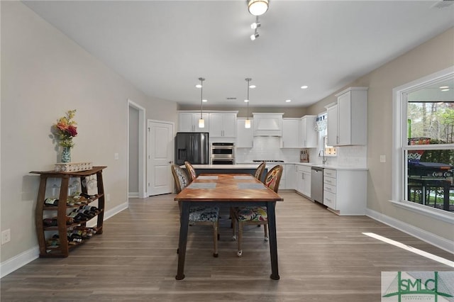 126 Canter Ct, Savannah, GA 31406 - dining room featuring baseboards, healthy amount of natural light, wood finished floors, and recessed lighting