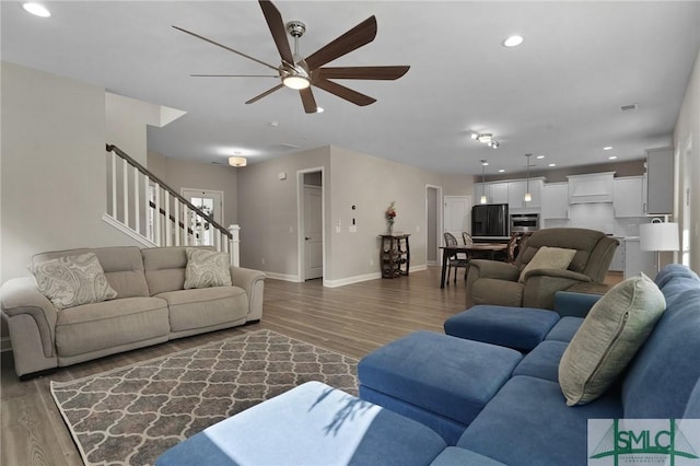 126 Canter Ct, Savannah, GA 31406 - living area featuring ceiling fan, wood finished floors, stairs, baseboards, and recessed lighting