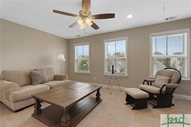 126 Canter Ct, Savannah, GA 31406 - living room with healthy amount of natural light, light carpet, baseboards, a ceiling fan, and recessed lighting