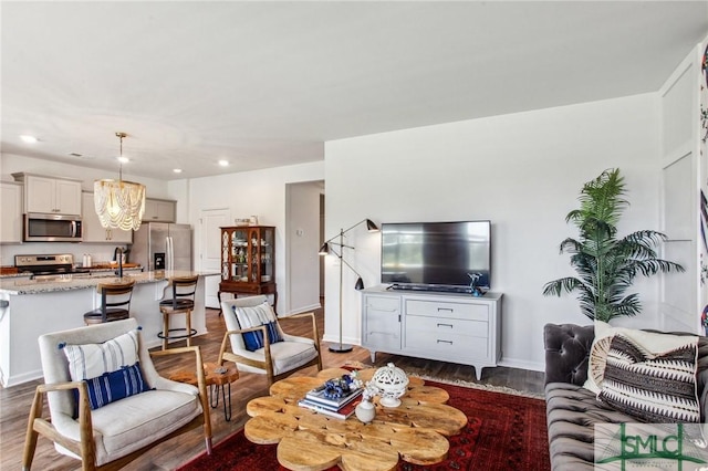 111 Troupe Dr, Savannah, GA 31407 - living room featuring dark wood-style flooring and recessed lighting