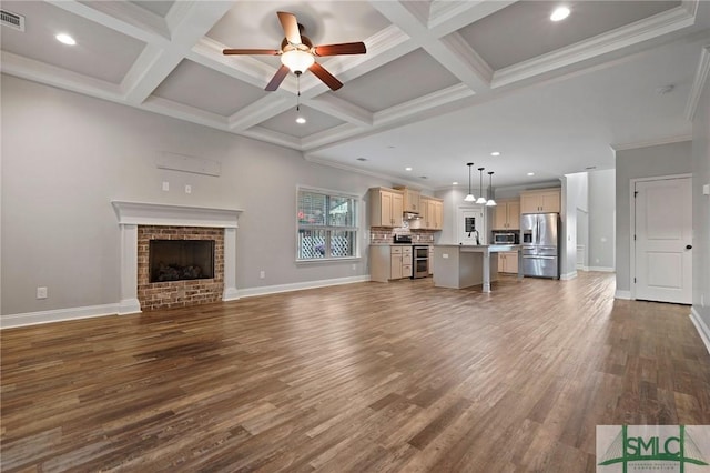 unfurnished living room featuring visible vents, dark wood-style flooring, beam ceiling, and a ceiling fan