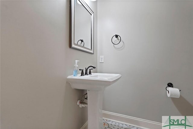 bathroom featuring baseboards