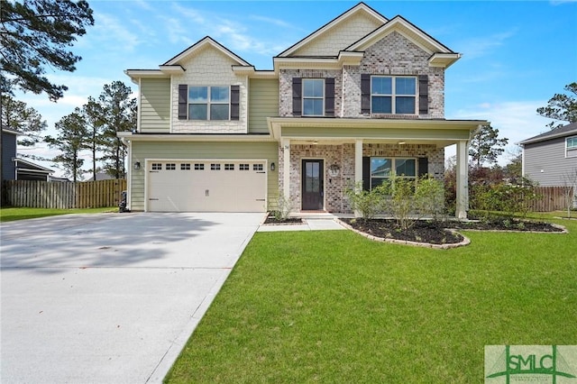 craftsman inspired home featuring driveway, a garage, fence, and a front yard