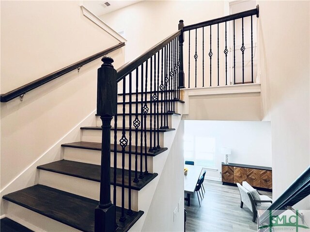 125 Long Creek Ln, Richmond Hill, GA 31324 - stairway featuring wood finished floors