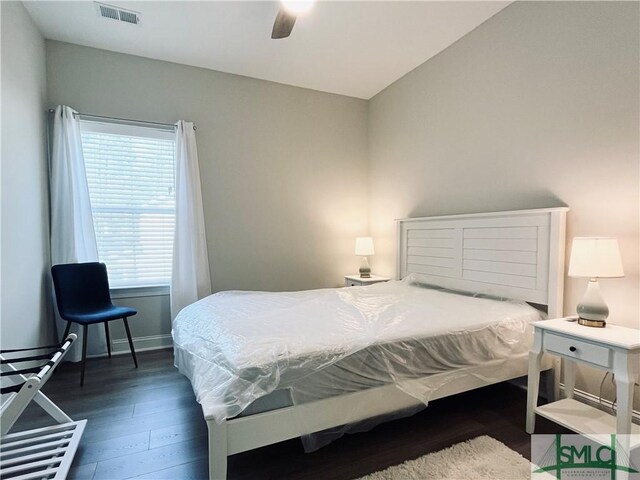 125 Long Creek Ln, Richmond Hill, GA 31324 - bedroom featuring multiple windows, wood finished floors, baseboards, and ceiling fan