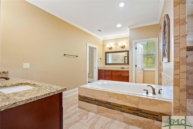 bathroom with baseboards, a bath, crown molding, vanity, and marble finish floor