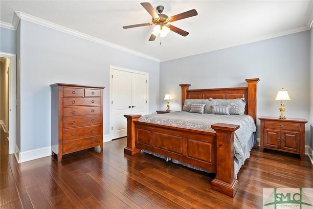 bedroom with dark wood-type flooring, crown molding, baseboards, and a ceiling fan