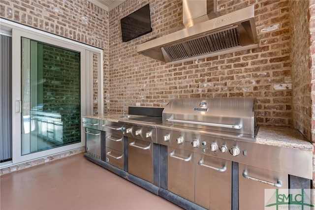 view of patio / terrace with a sink and area for grilling