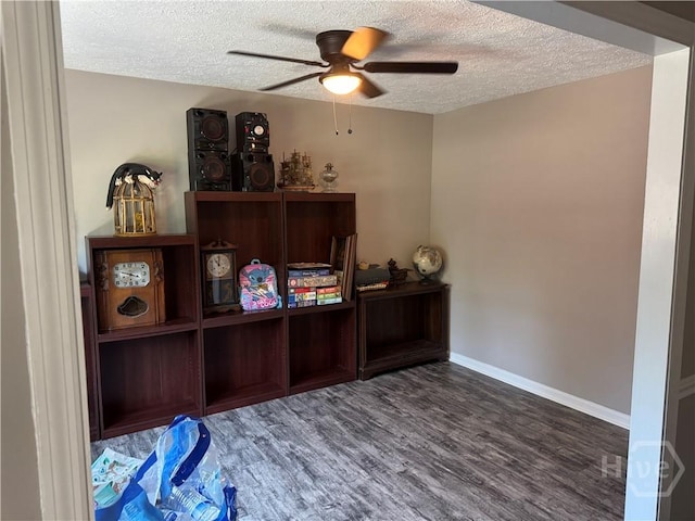 7313 Tropical Way, Savannah, GA 31410 - office area featuring a textured ceiling, wood finished floors, a ceiling fan, and baseboards