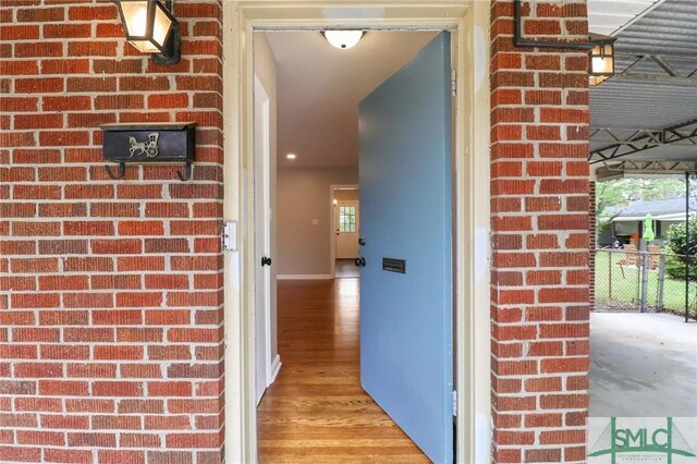 1517 E 52nd St, Savannah, GA 31404 - property entrance featuring brick siding