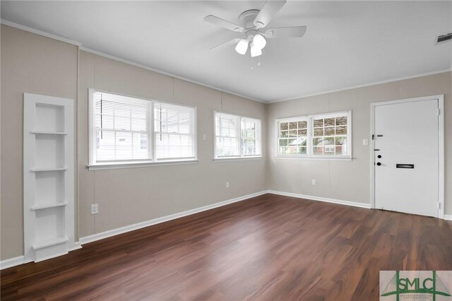 1517 E 52nd St, Savannah, GA 31404 - foyer with crown molding, wood finished floors, a ceiling fan, and baseboards
