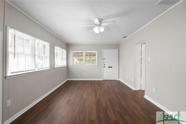 1517 E 52nd St, Savannah, GA 31404 - spare room featuring wood finished floors, ornamental molding, ceiling fan, and baseboards