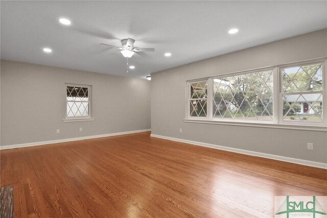 1517 E 52nd St, Savannah, GA 31404 - empty room featuring plenty of natural light, recessed lighting, ceiling fan, and wood finished floors