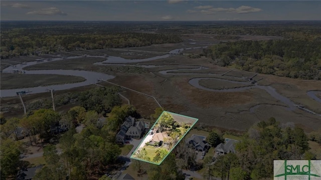 drone / aerial view with a view of trees