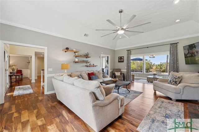 living area featuring ceiling fan, wood finished floors, vaulted ceiling, and crown molding