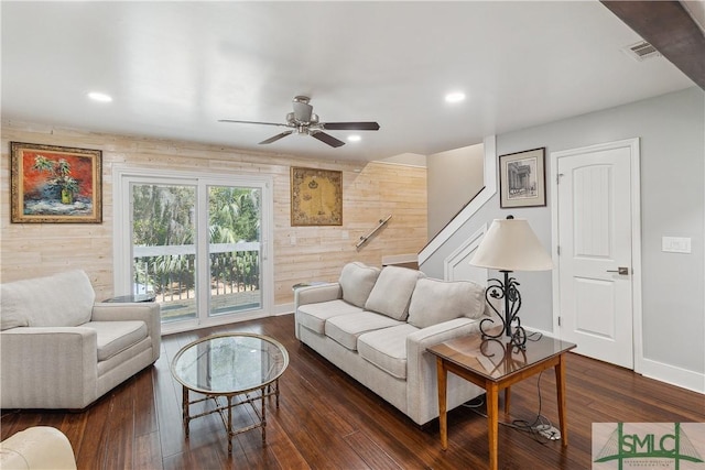 1000 Sea Island Rd Unit 56, Saint Simons Island, GA 31522 - living area with dark wood finished floors, ceiling fan, wooden walls, and recessed lighting