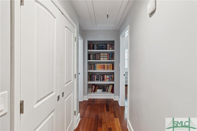 1000 Sea Island Rd Unit 56, Saint Simons Island, GA 31522 - corridor with hardwood / wood-style flooring and attic access