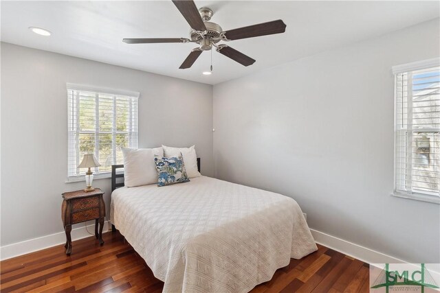 1000 Sea Island Rd Unit 56, Saint Simons Island, GA 31522 - bedroom with multiple windows, wood finished floors, recessed lighting, and a ceiling fan