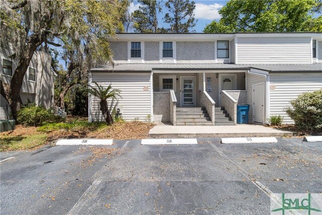 1000 Sea Island Rd Unit 56, Saint Simons Island, GA 31522 - multi unit property featuring covered porch and uncovered parking