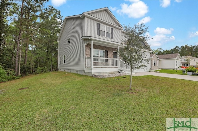 traditional home featuring concrete driveway, brick siding, a front lawn, crawl space, and a porch