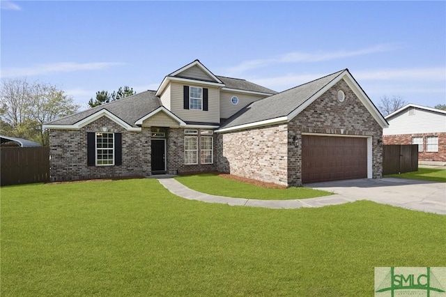 craftsman inspired home with concrete driveway, a front yard, fence, and an attached garage