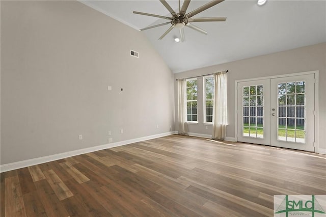 empty room featuring a ceiling fan, visible vents, wood finished floors, french doors, and baseboards
