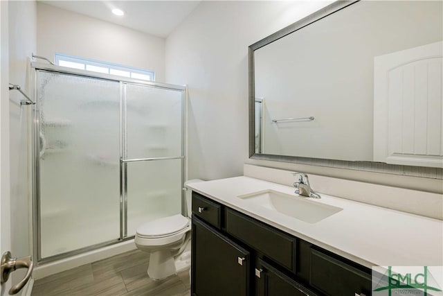 135 Sessile Oak Dr, Savannah, GA 31419 - bathroom featuring toilet, vanity, and a shower stall
