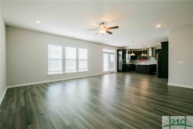 135 Sessile Oak Dr, Savannah, GA 31419 - unfurnished living room with baseboards, ceiling fan, recessed lighting, and dark wood-style flooring