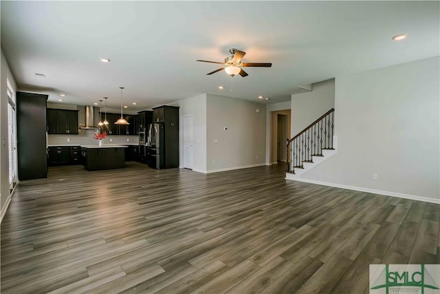 135 Sessile Oak Dr, Savannah, GA 31419 - unfurnished living room featuring baseboards, stairs, recessed lighting, a ceiling fan, and dark wood-style floors
