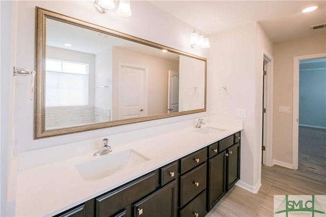135 Sessile Oak Dr, Savannah, GA 31419 - full bath featuring double vanity, visible vents, baseboards, and a sink