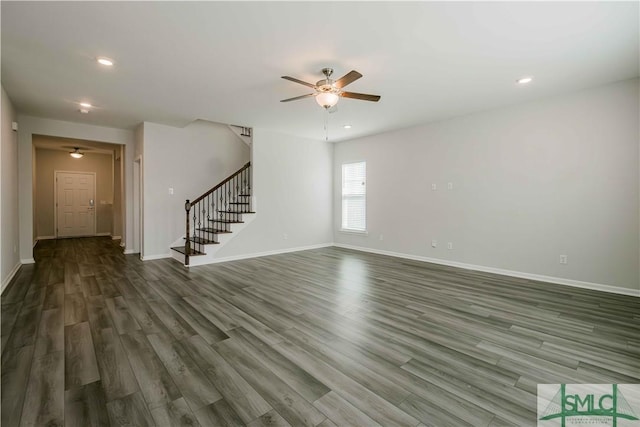 135 Sessile Oak Dr, Savannah, GA 31419 - unfurnished living room featuring baseboards, stairs, ceiling fan, and wood finished floors
