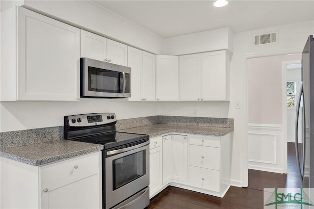 13 Burnt Tree Rd, Savannah, GA 31419 - kitchen featuring stainless steel appliances, white cabinetry, dark wood-type flooring, recessed lighting, and light countertops