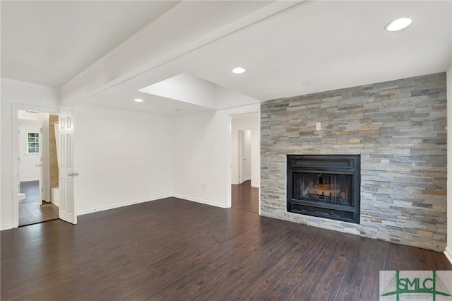 13 Burnt Tree Rd, Savannah, GA 31419 - unfurnished living room with wood finished floors, a fireplace, and recessed lighting