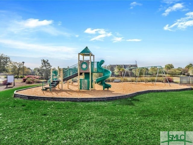 community play area with a lawn