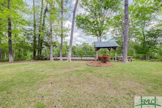 view of yard with a gazebo and fence