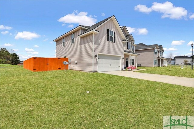 31 Fridley Ln, Hinesville, GA 31313 - view of side of property with an attached garage, a yard, and concrete driveway