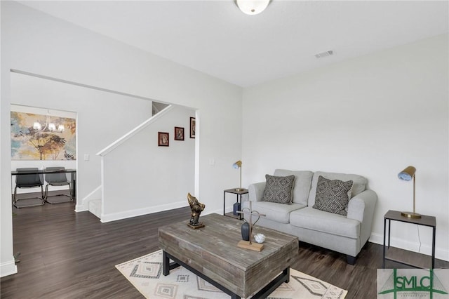 31 Fridley Ln, Hinesville, GA 31313 - living area featuring stairway, visible vents, baseboards, and wood finished floors