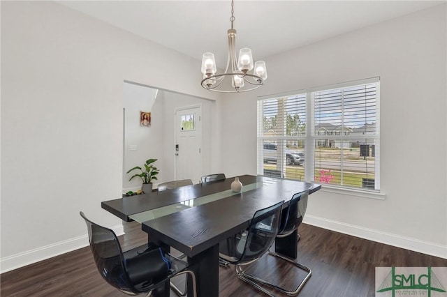 31 Fridley Ln, Hinesville, GA 31313 - dining space featuring dark wood-type flooring, a notable chandelier, and baseboards