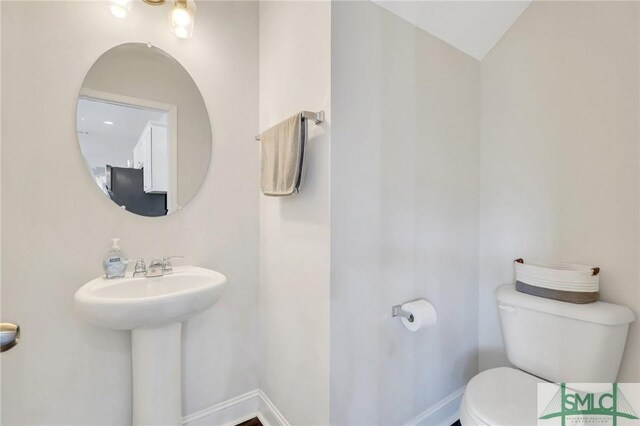 31 Fridley Ln, Hinesville, GA 31313 - bathroom with toilet and baseboards