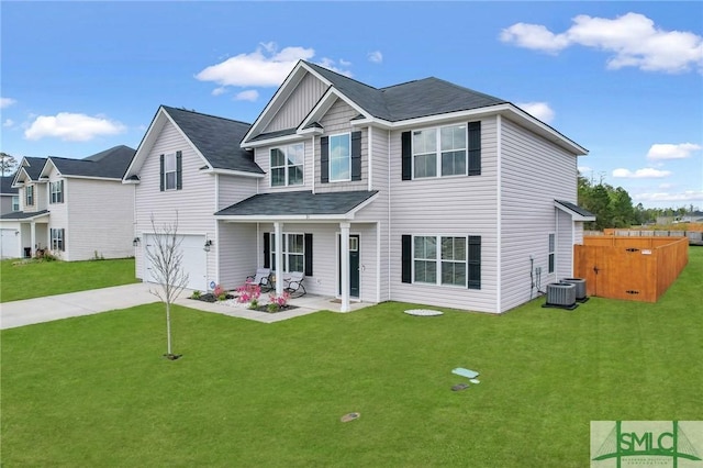31 Fridley Ln, Hinesville, GA 31313 - view of front facade featuring a front yard, central air condition unit, an attached garage, board and batten siding, and concrete driveway