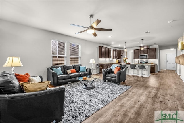 224 Benelli Dr, Pooler, GA 31322 - living area with light wood-style floors, a ceiling fan, visible vents, and recessed lighting