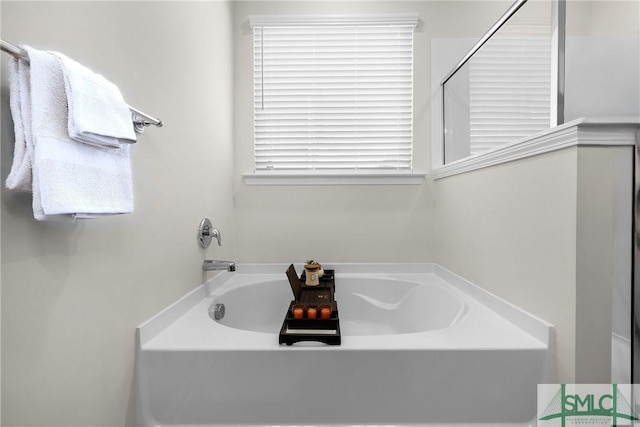 224 Benelli Dr, Pooler, GA 31322 - bathroom featuring a garden tub